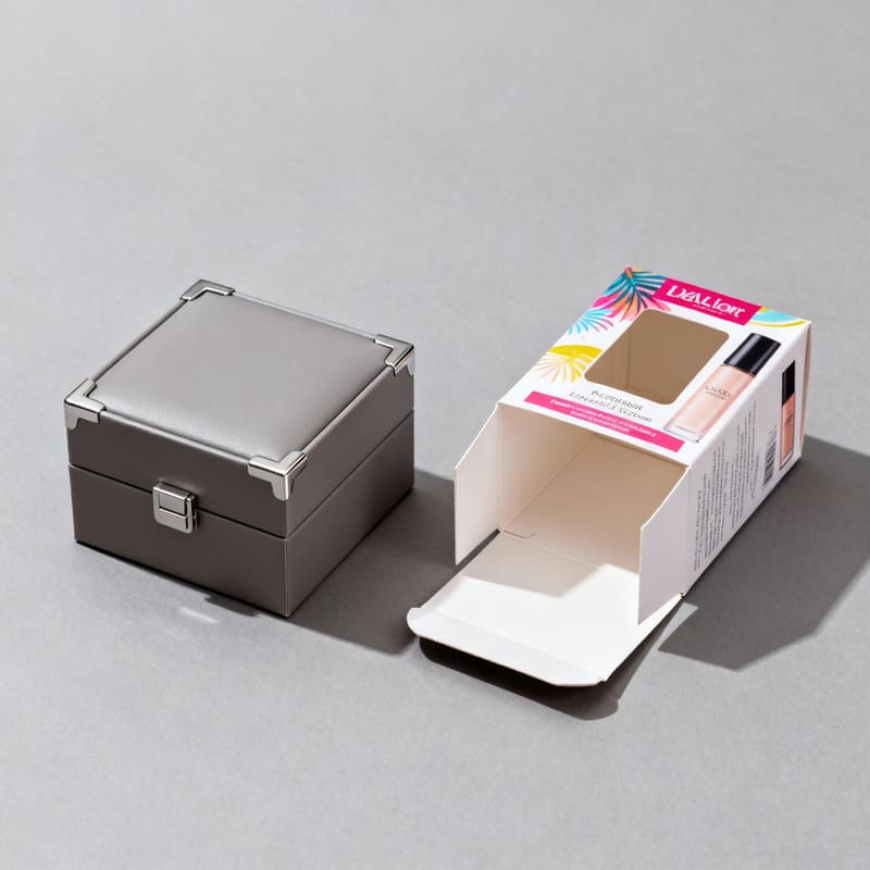 A side-by-side comparison showing a sturdy, premium rigid box for a watch and a lightweight, printed folding carton for cosmetics